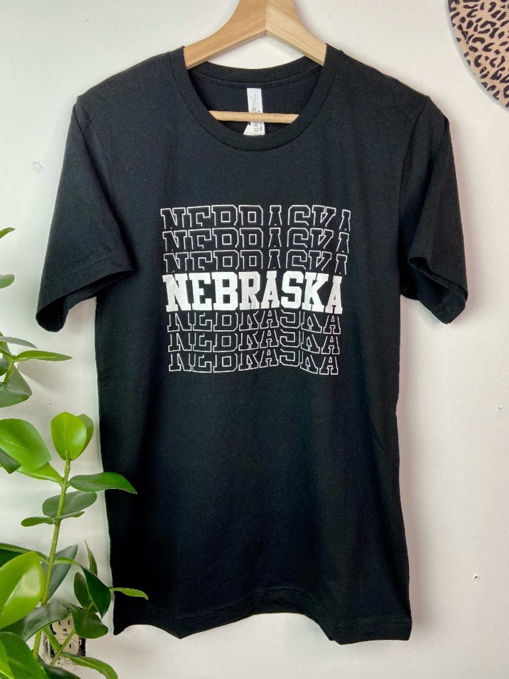 Nebraska Stacked Graphic Tee | Black Bella Canvas Shirt | Minimalist State Pride